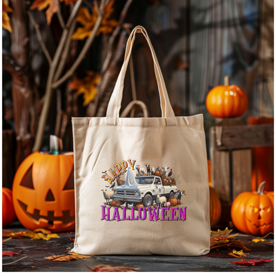 a canvas bag with a truck and pumpkins in the background