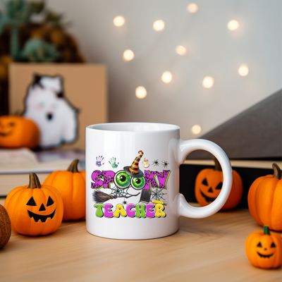 a white coffee mug sitting on top of a wooden table