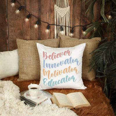 a pillow with a quote on it sitting on a bed