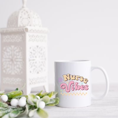 a white coffee mug sitting on top of a table