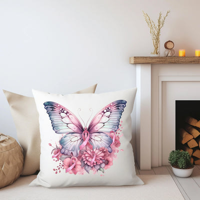 a white pillow with a pink butterfly on it