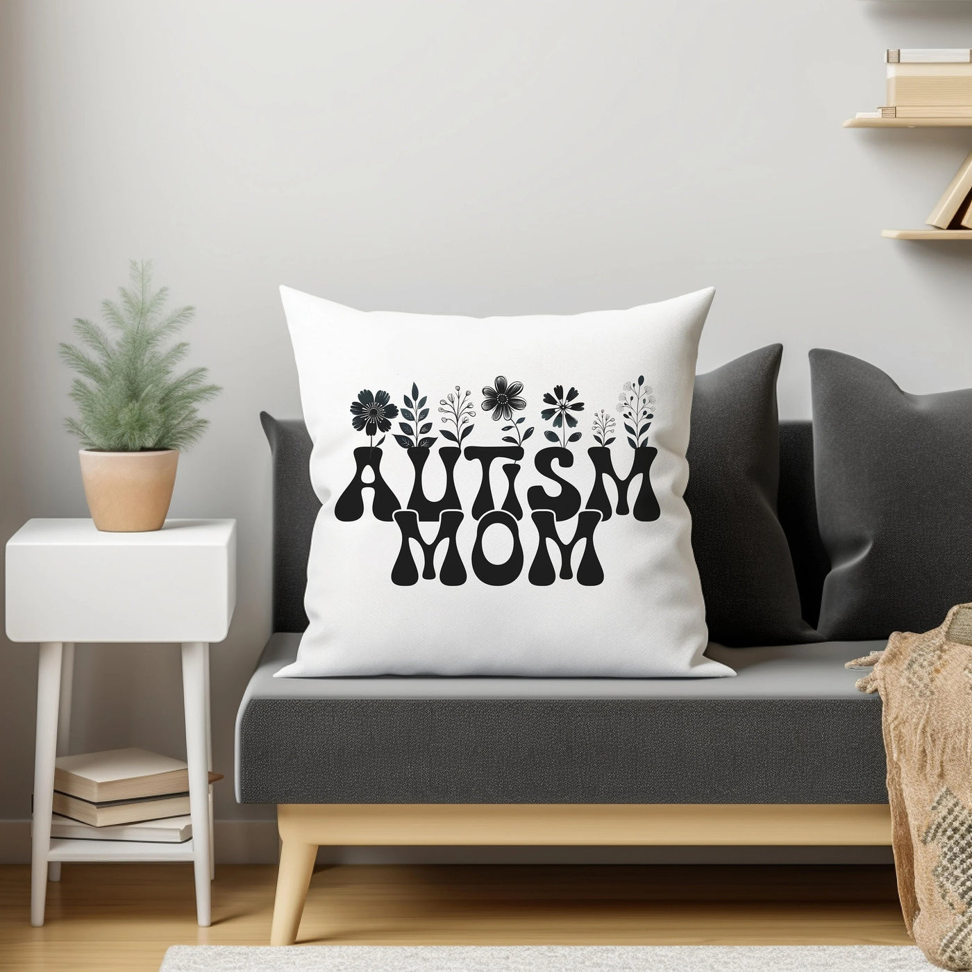 a couch with a pillow that says autism mom