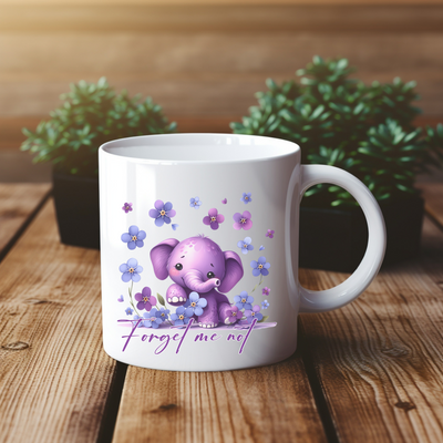 a coffee mug with a picture of an elephant on it