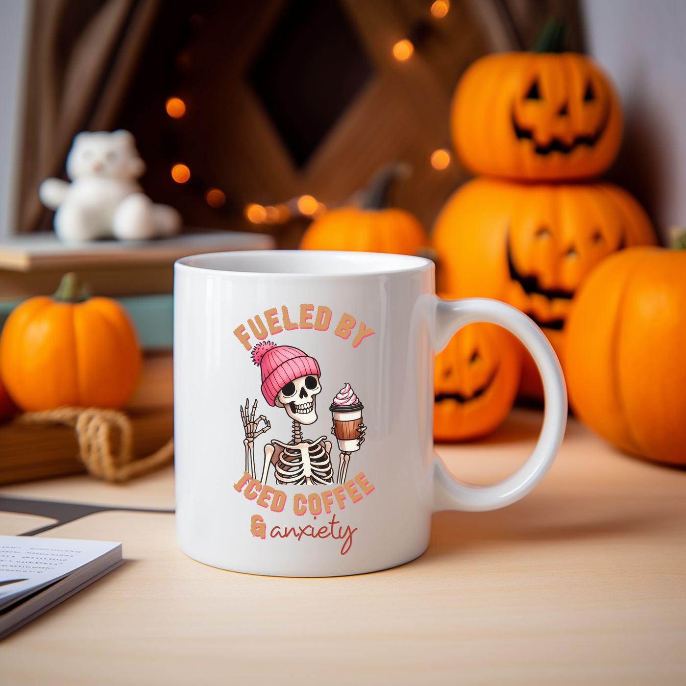 a white coffee mug with a skeleton holding a cup of coffee