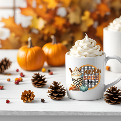 a cup of coffee with whipped cream and pine cones