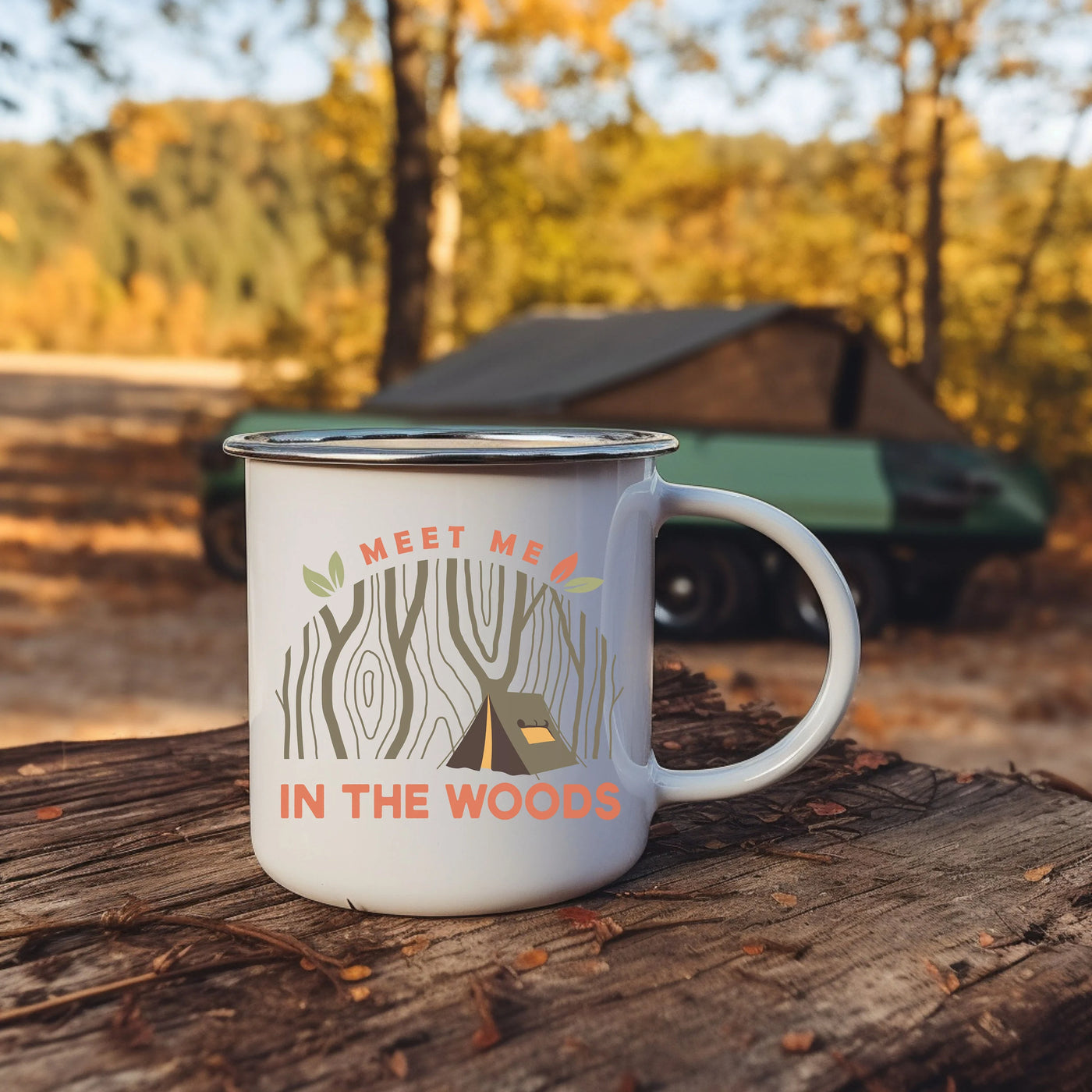 a white coffee mug sitting on top of a wooden table