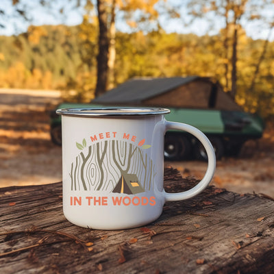 a white coffee mug sitting on top of a wooden table