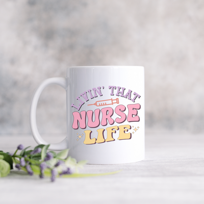 a white coffee mug with the words i'm that nurse life printed on it