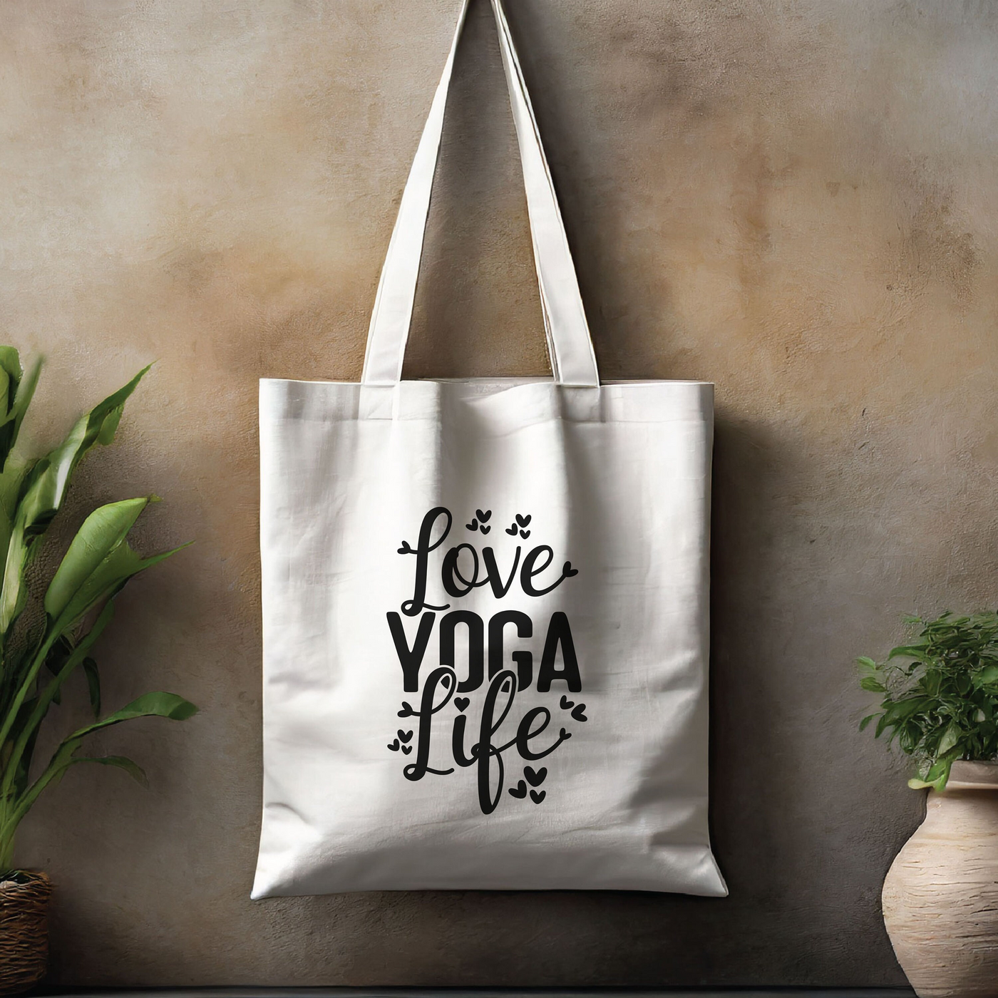 a tote bag hanging on a wall next to a potted plant