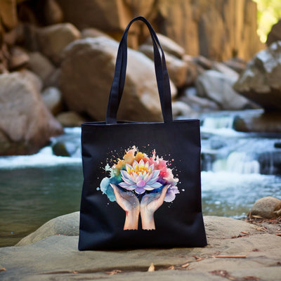 a black bag with a picture of a hand holding a flower