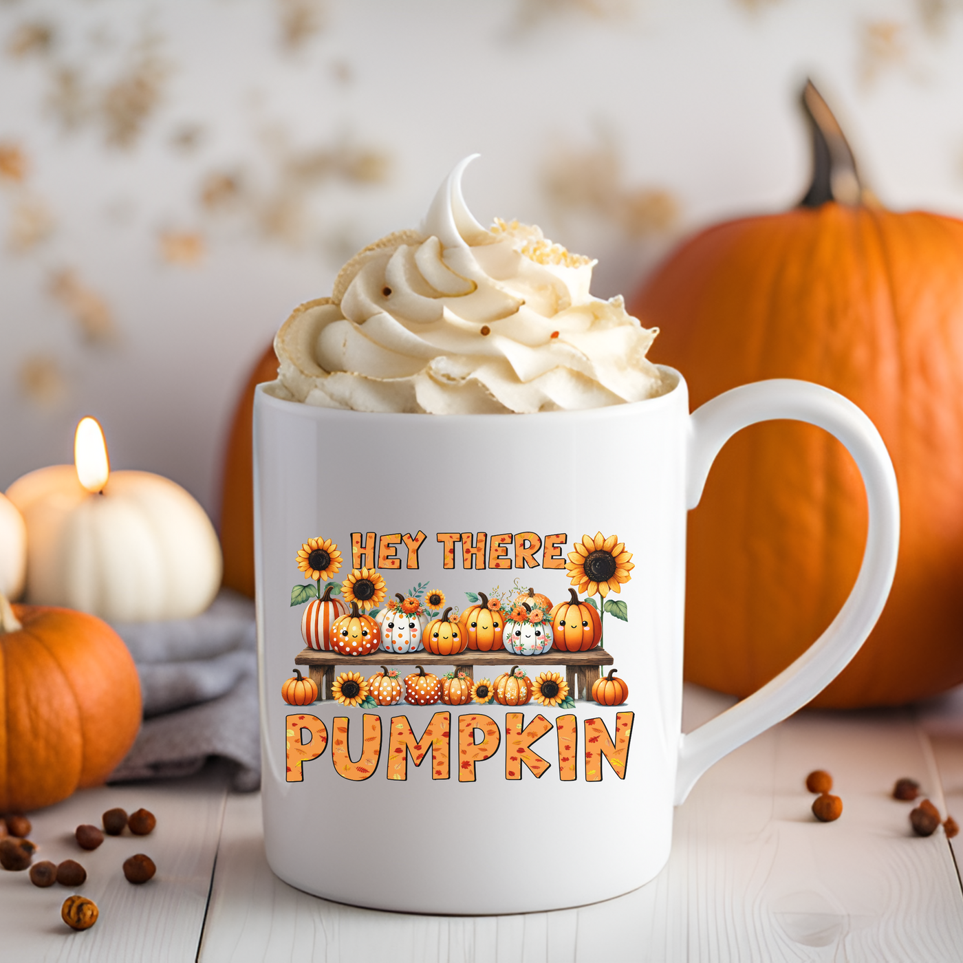 a white coffee mug with a pumpkin design on it