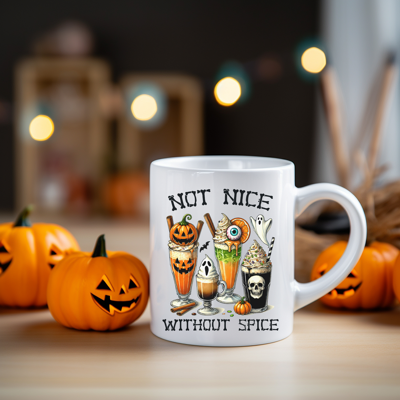 a white coffee mug with a picture of two pumpkins