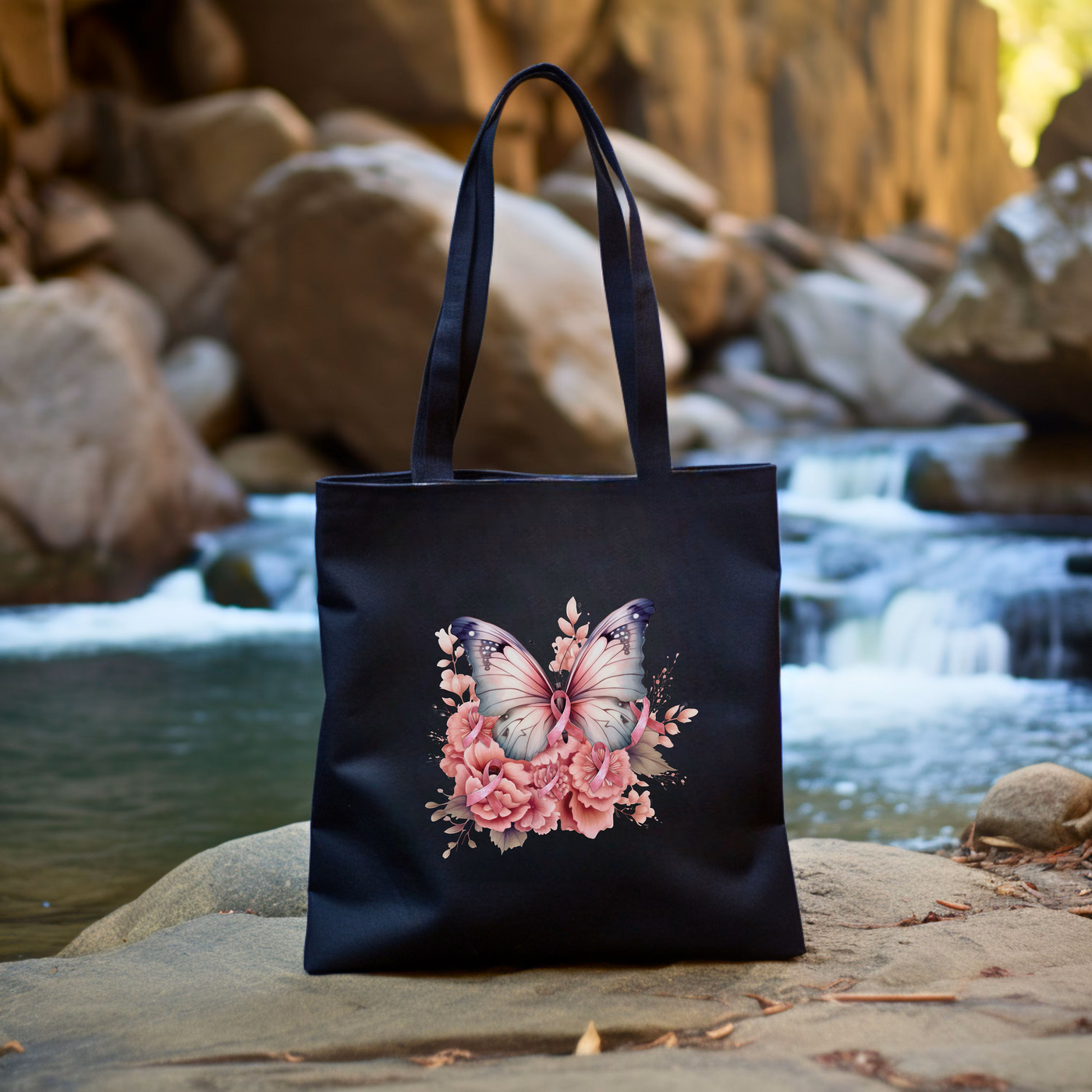 a black bag with a picture of a butterfly on it