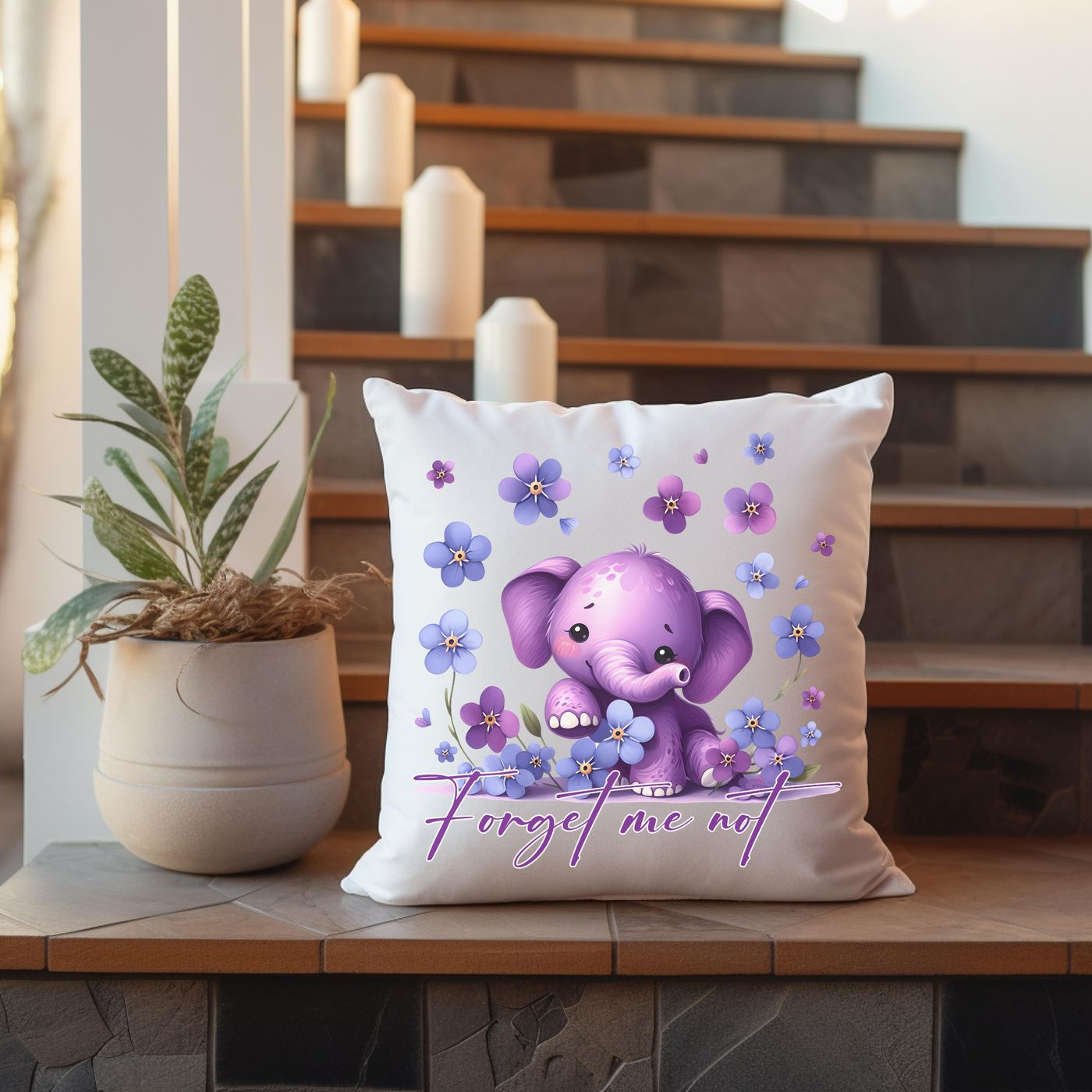 a pillow with a picture of an elephant on it