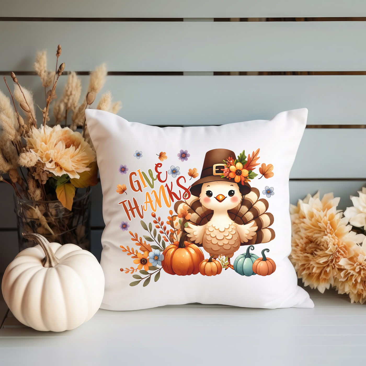 a white pillow with a thanksgiving turkey on it