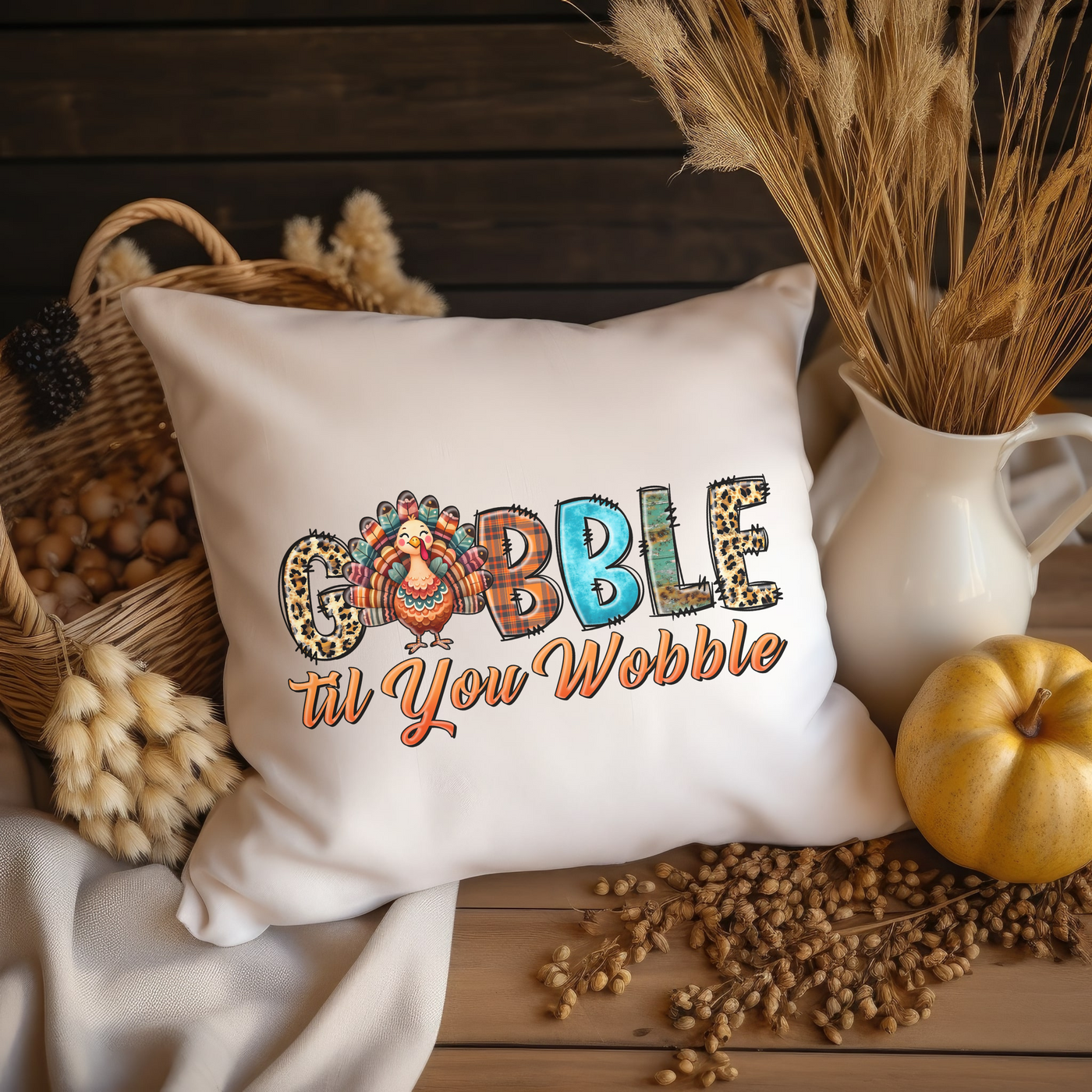 a decorative pillow with the word gobble on it