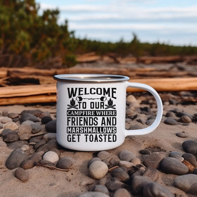 a white coffee mug sitting on top of a pile of rocks