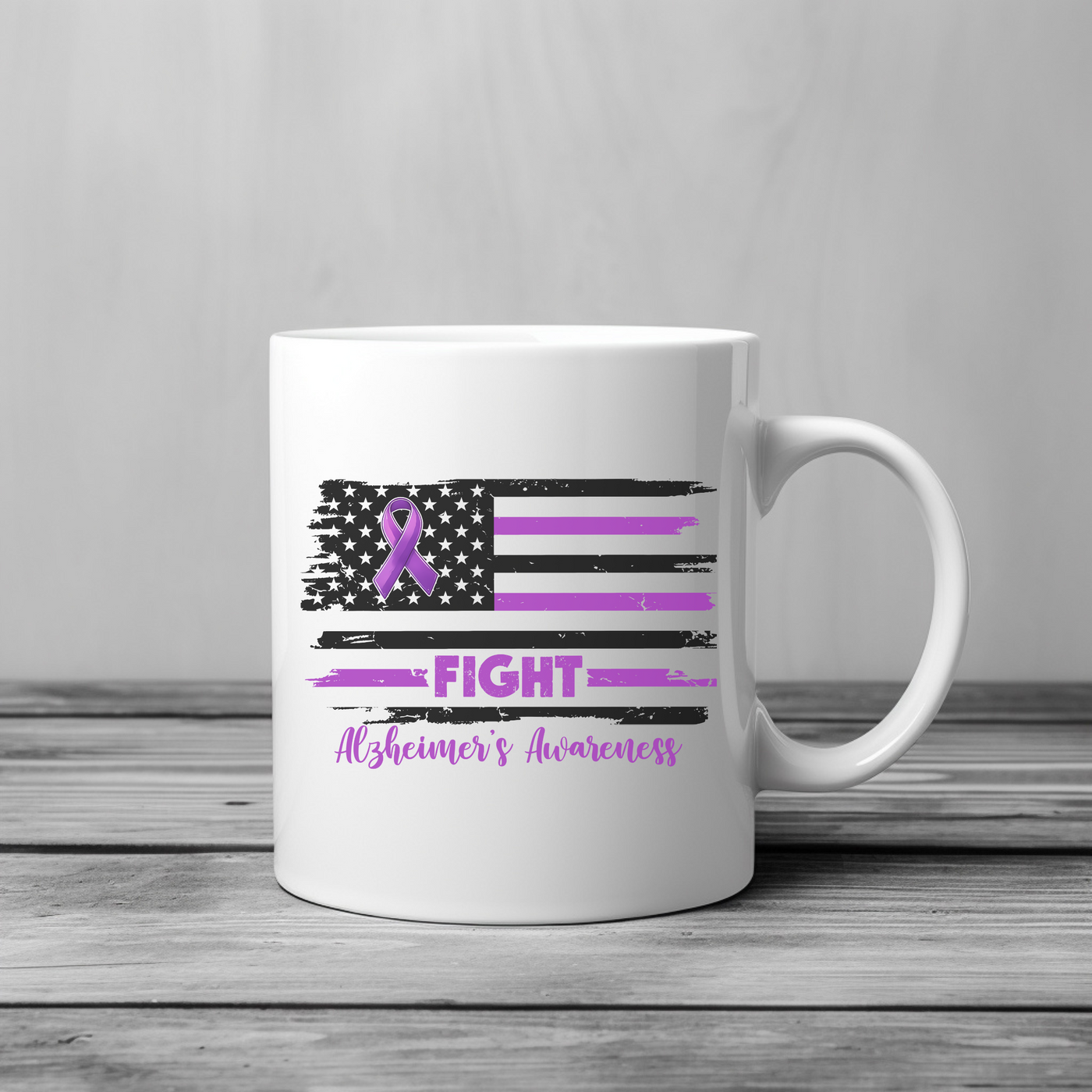 a white coffee mug with a purple ribbon on it