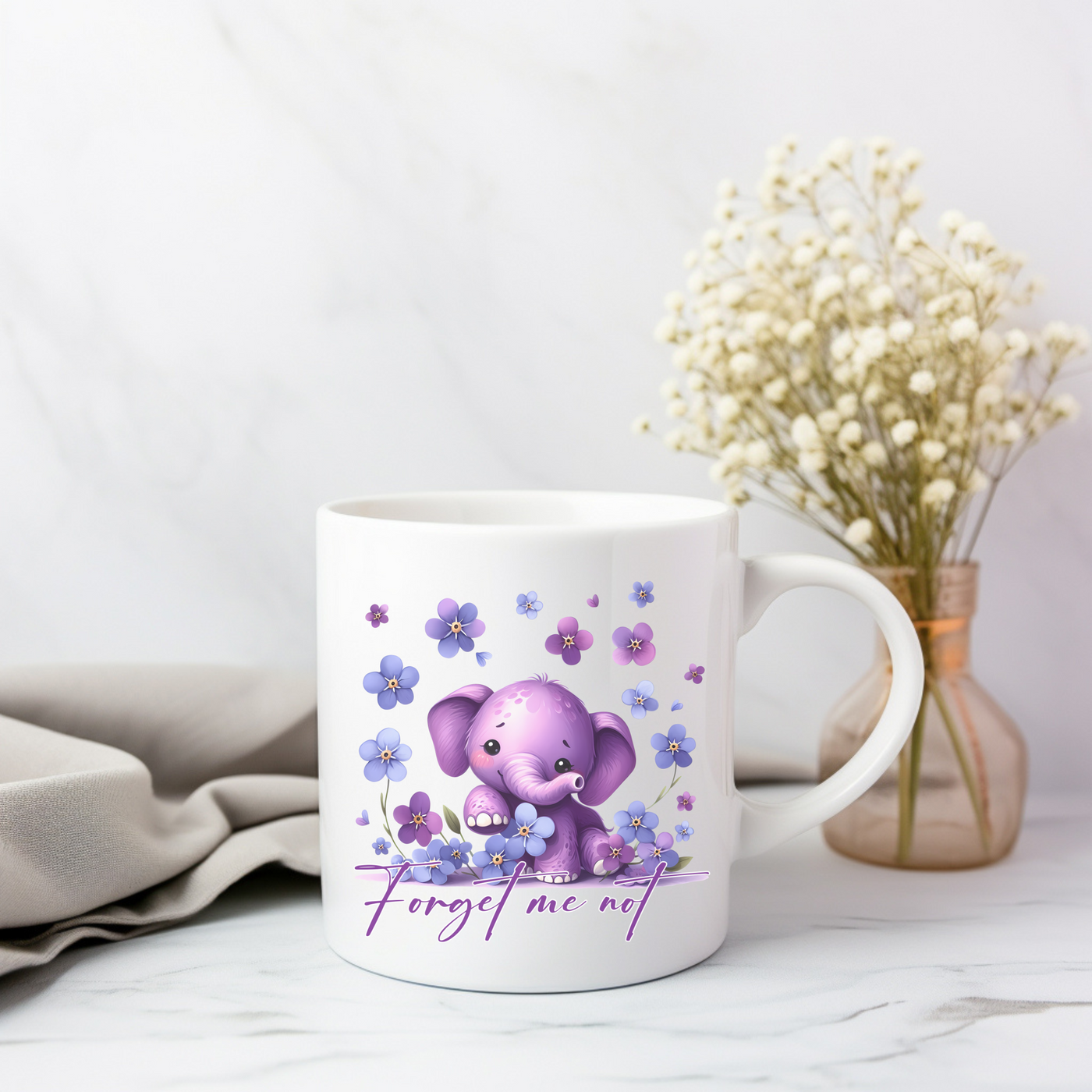 a coffee mug with a picture of an elephant on it