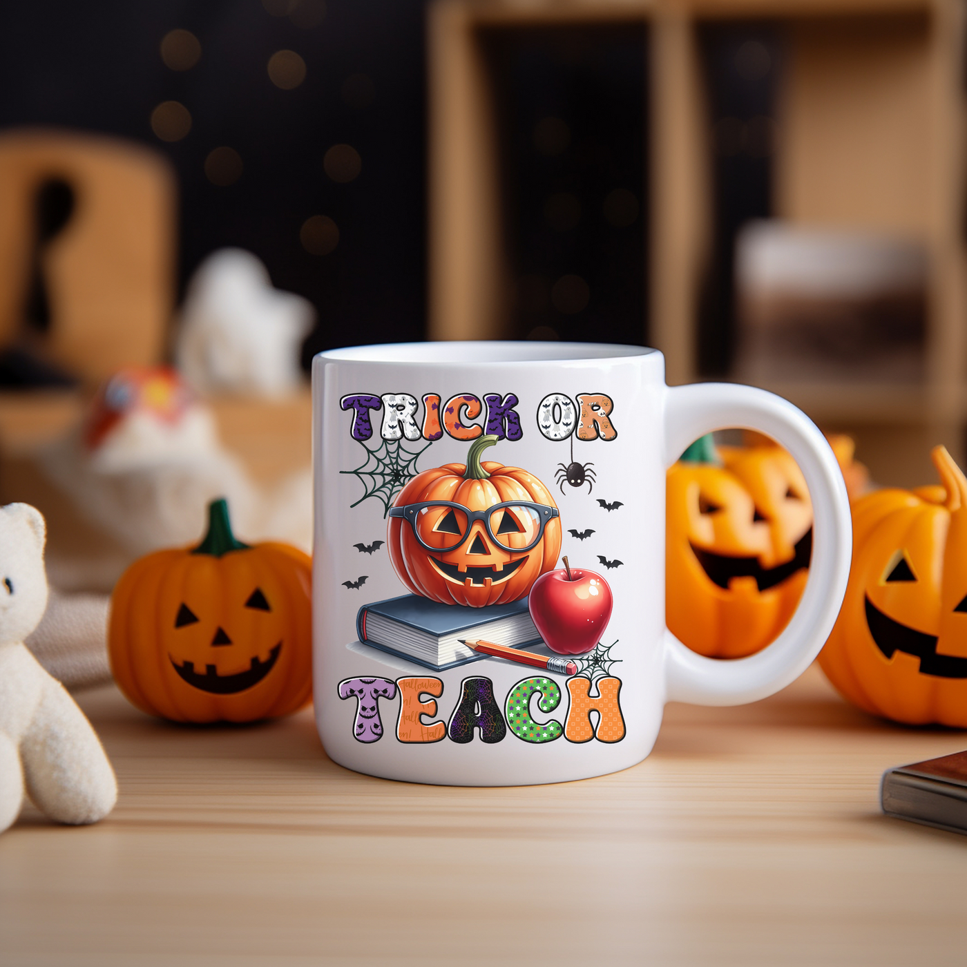 a white coffee mug with a trick or treat on it