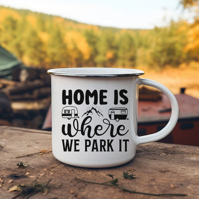 a camper mug sitting on top of a wooden table