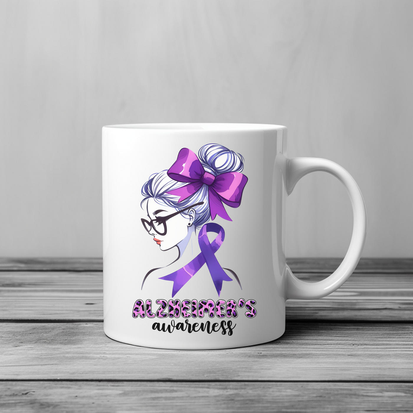 a white coffee mug with a purple ribbon on it