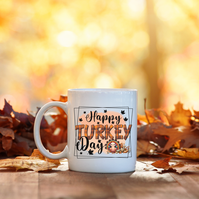 a white coffee mug sitting on top of a wooden table