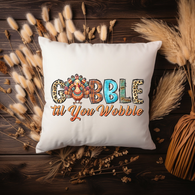 a white pillow with the words gobble on it