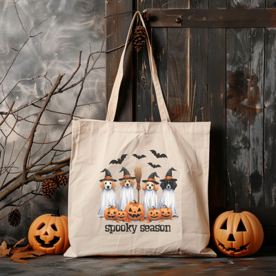 a trick or treat bag with three pumpkins on it