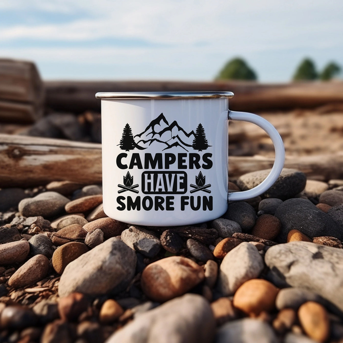 a camper's have a smore fun mug sitting on some rocks