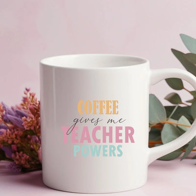 a coffee mug with the words coffee gives me teacher powers