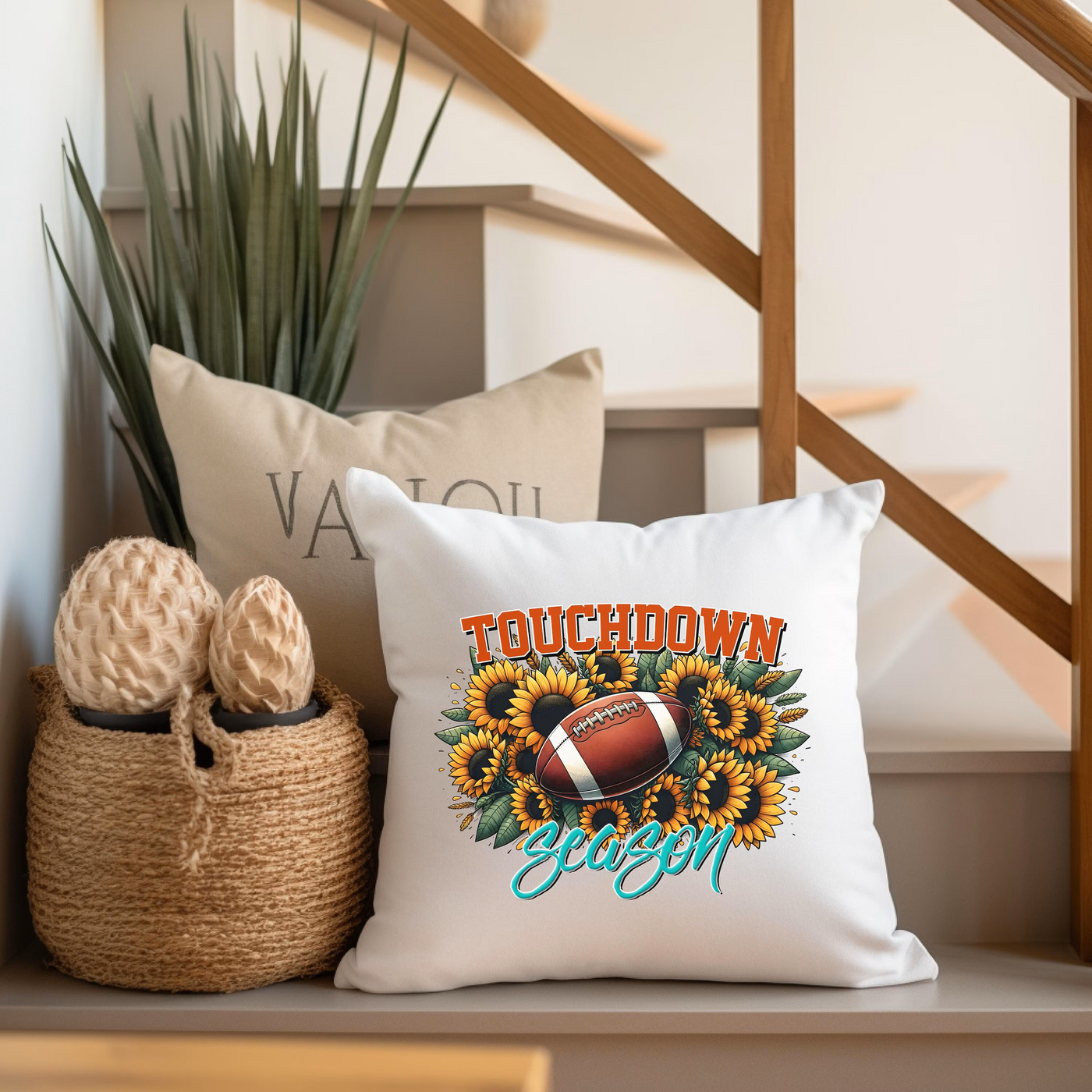 a throw pillow with a football and sunflowers on it