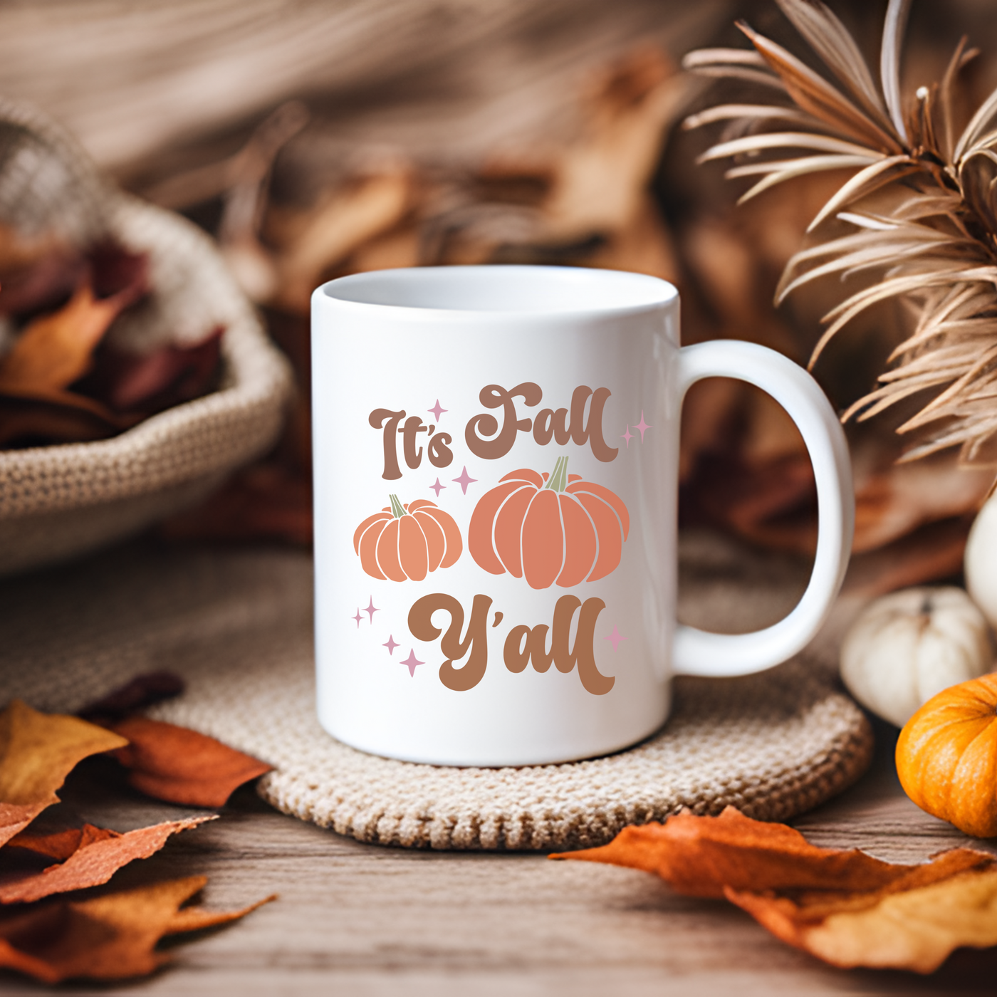 a white coffee mug with the words it's fall y'all on it