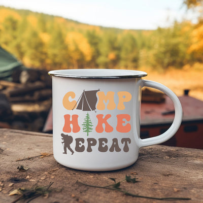 a camp mug sitting on top of a wooden table