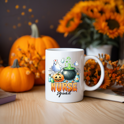 a white coffee mug sitting on top of a wooden table