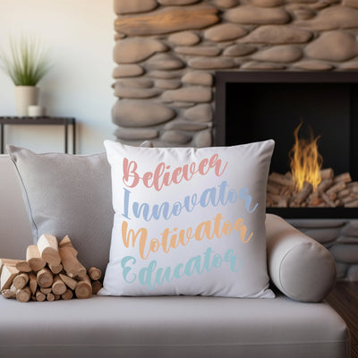 a pillow sitting on top of a couch next to a fire place