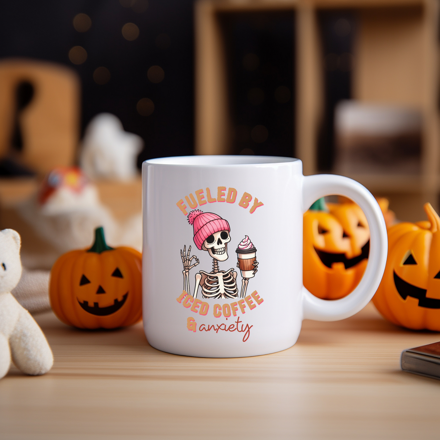 a white coffee mug with a skeleton on it