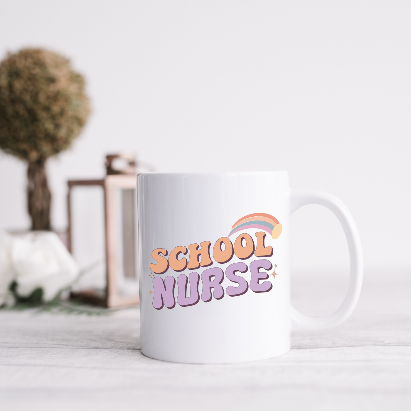 a white coffee mug sitting on top of a table