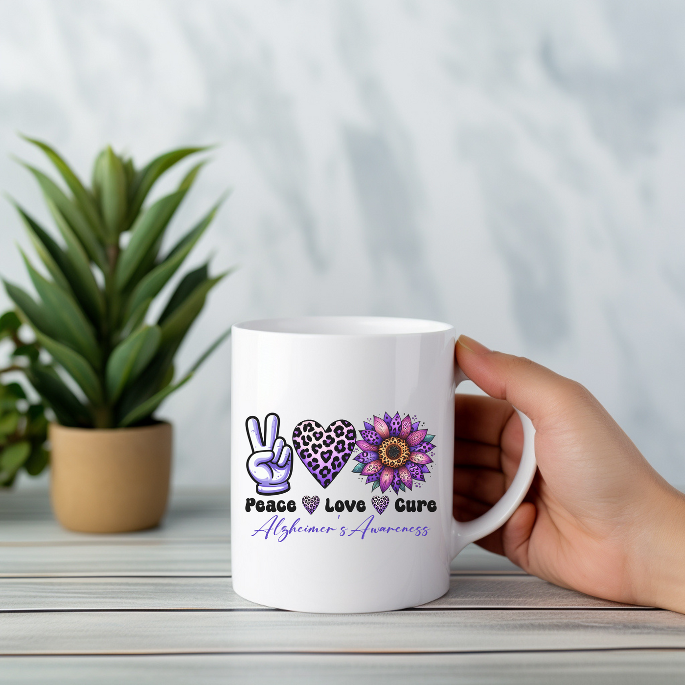 a person holding a coffee mug with peace and love