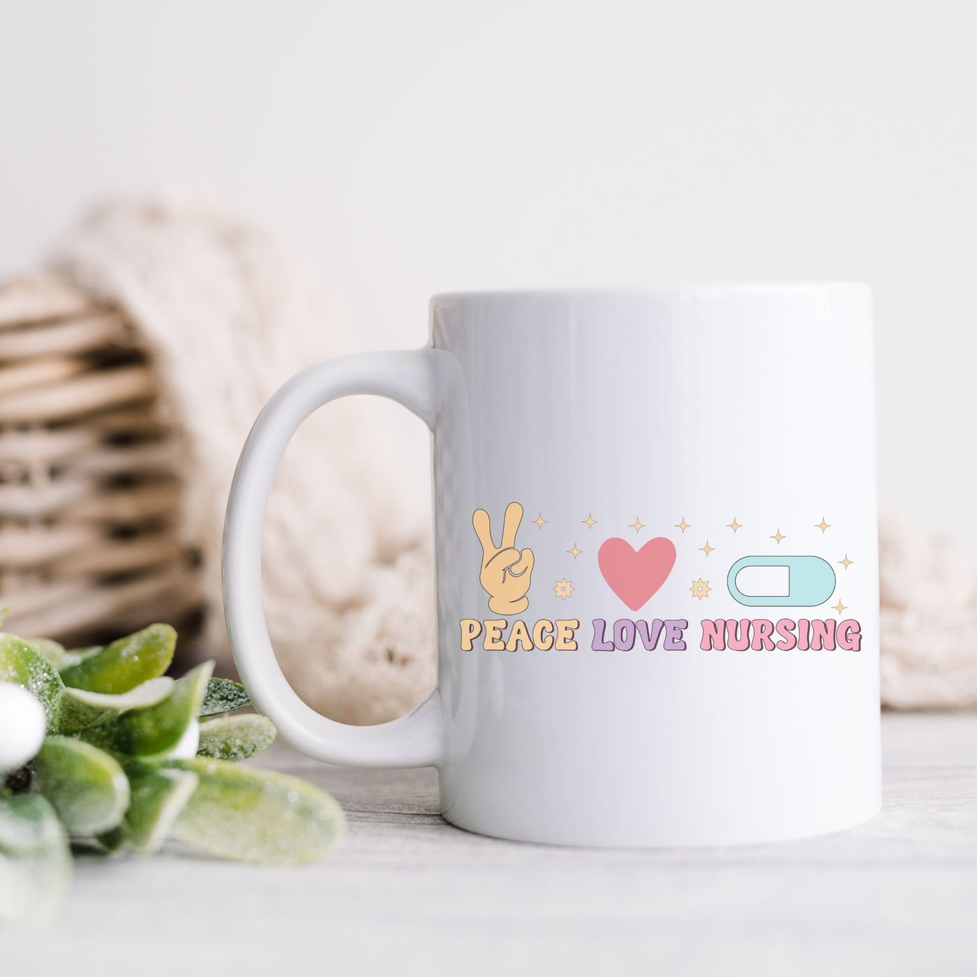 a white coffee mug with peace love nursing on it