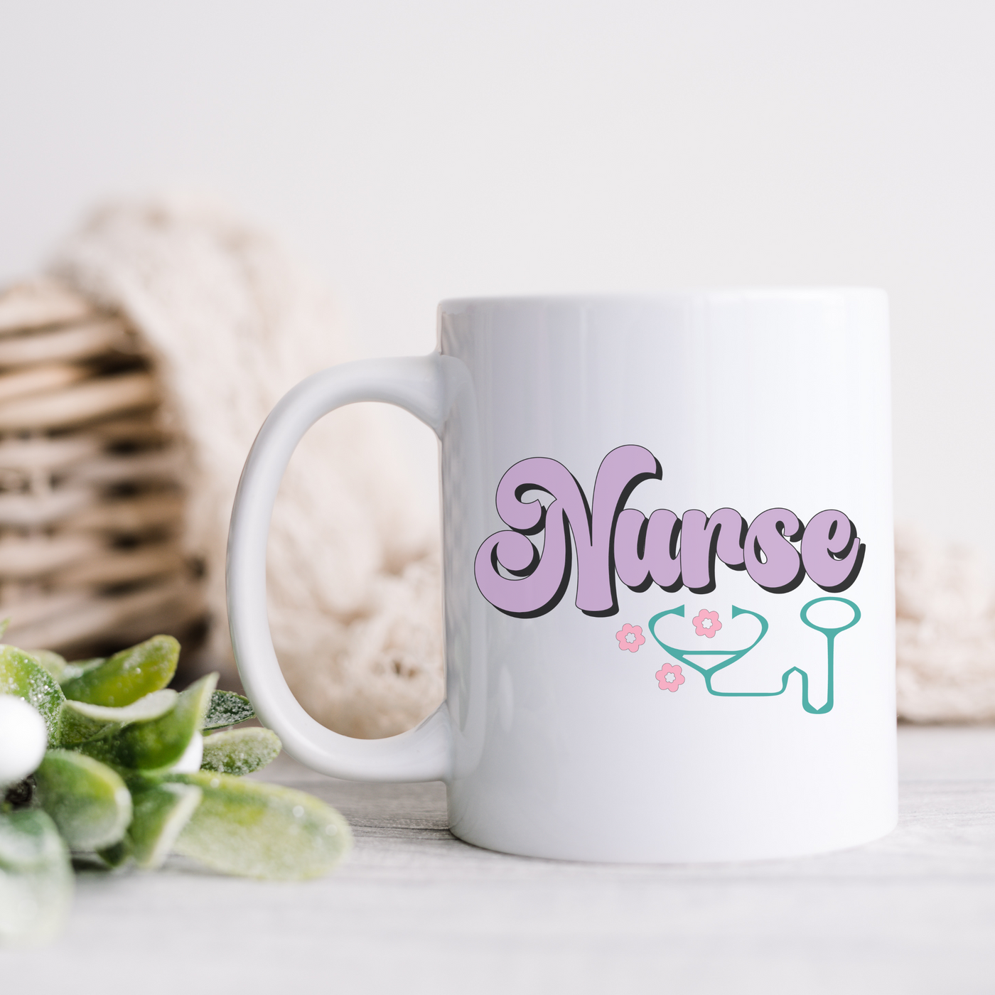 a white coffee mug with the word nurse on it