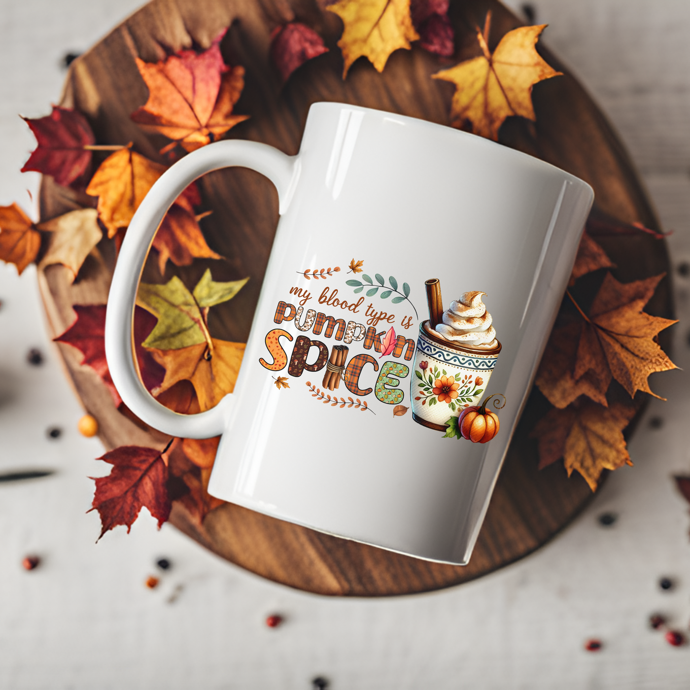 a coffee mug sitting on top of a wooden plate