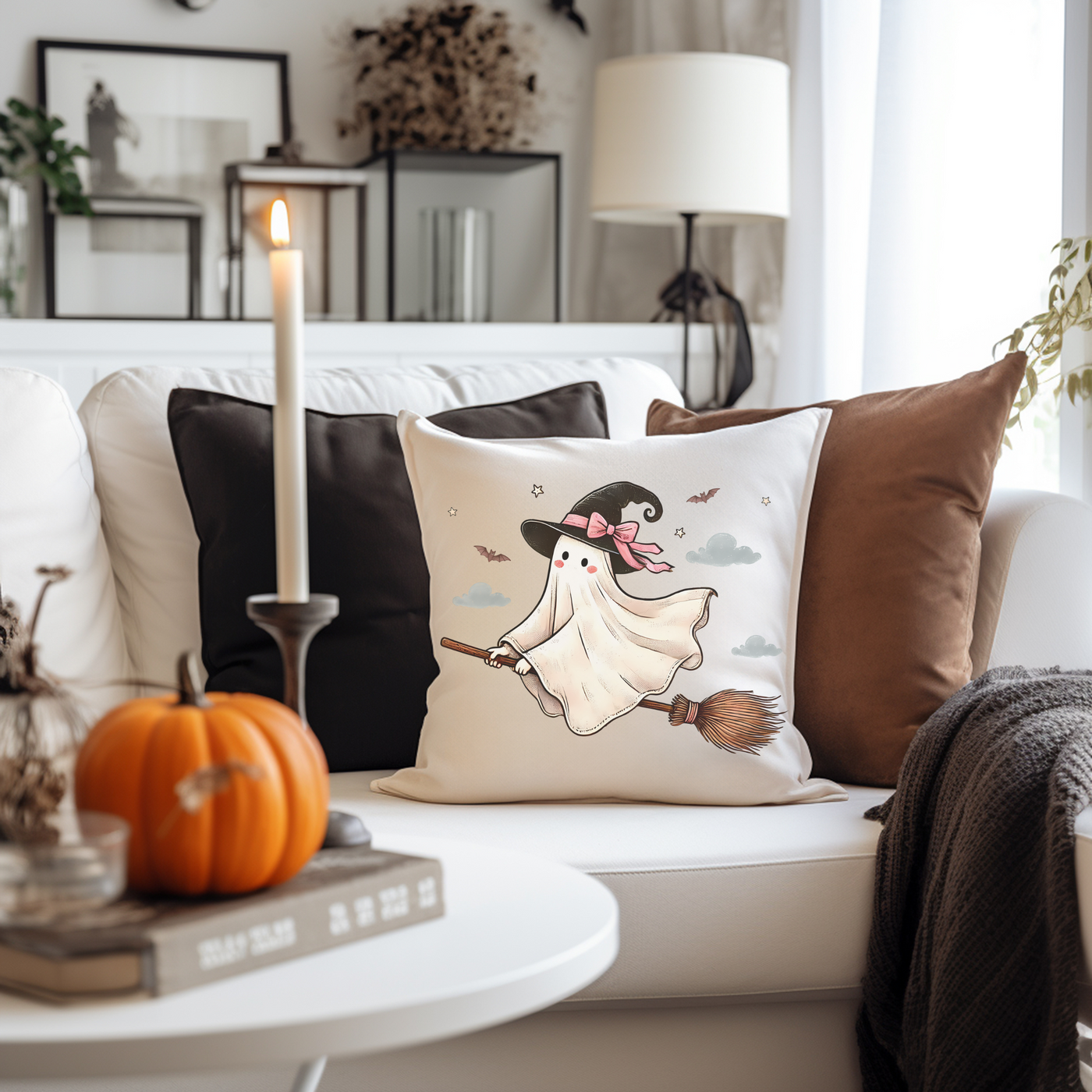 a living room with a white couch and a white coffee table