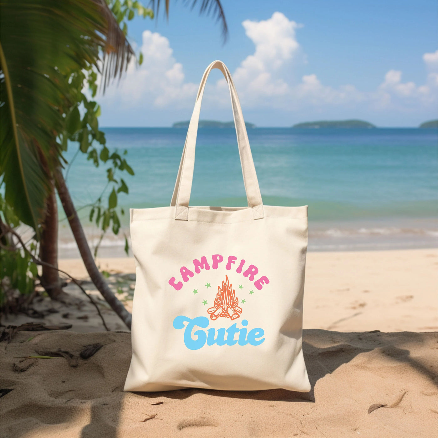 a white bag sitting on top of a sandy beach