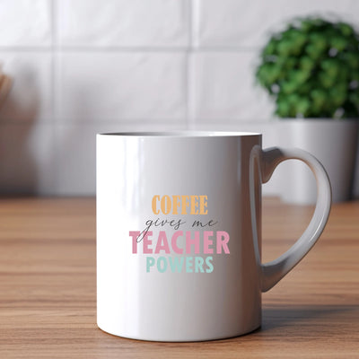 a coffee mug that says coffee gives me a teacher powers