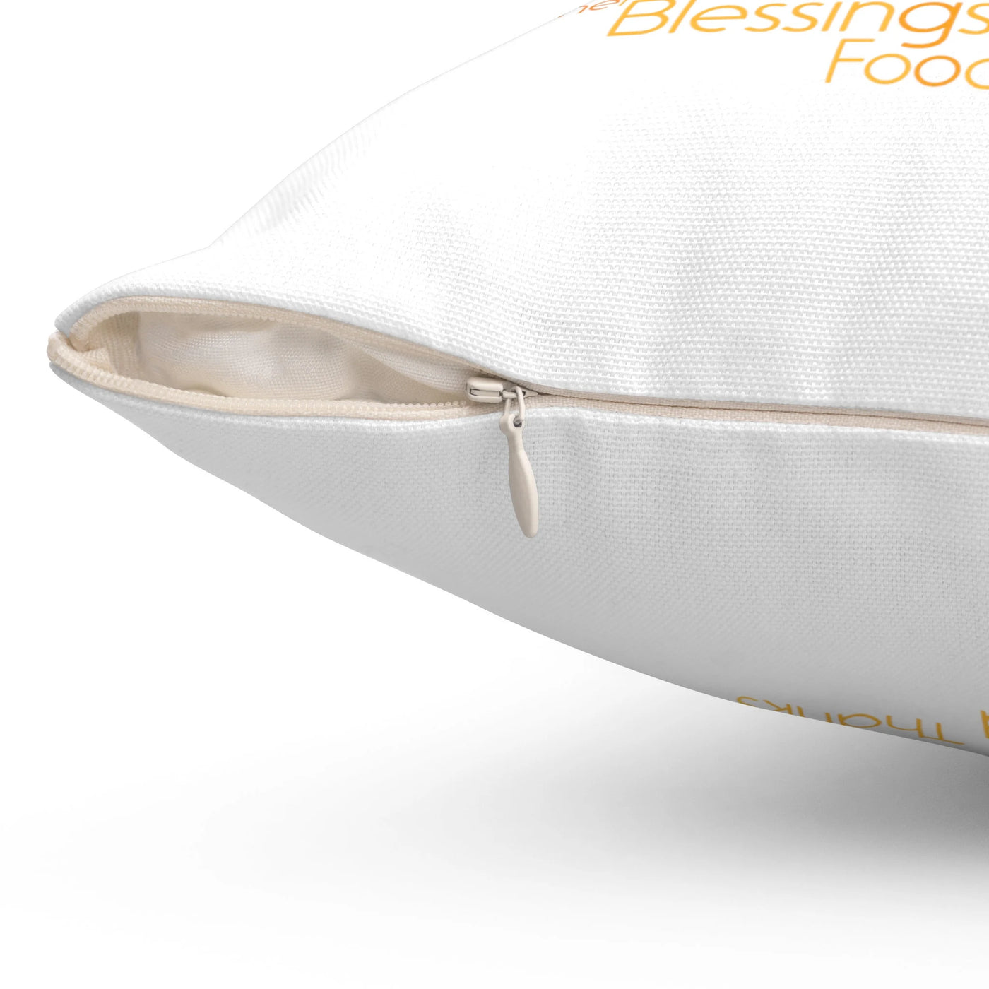 a close up of a pillow on a white surface