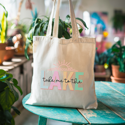 a tote bag that says take me to the lake