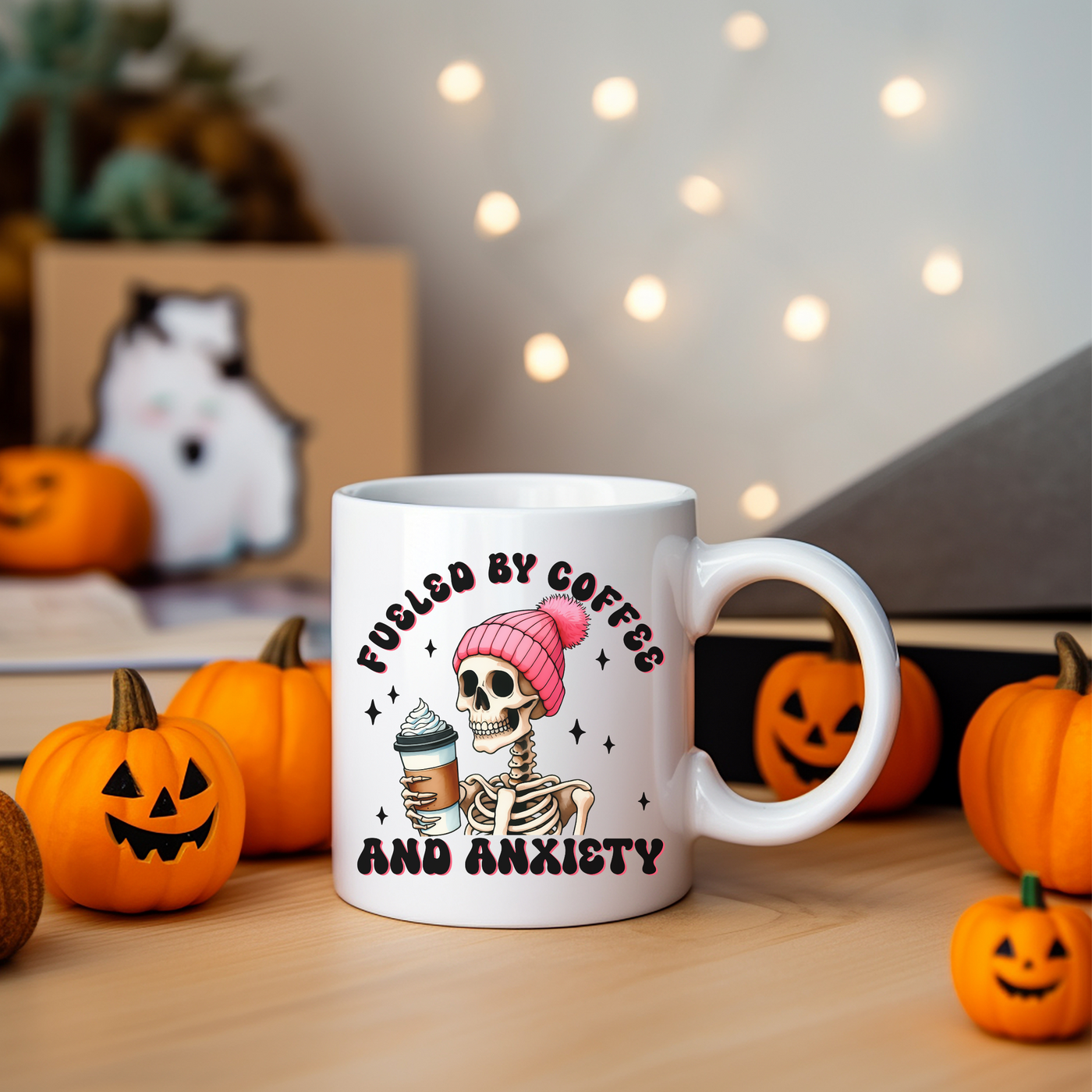 a coffee mug with a skeleton holding a cup of coffee