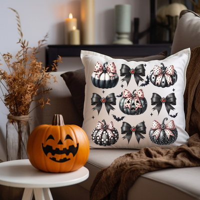 a pumpkin sitting on a couch next to a pillow