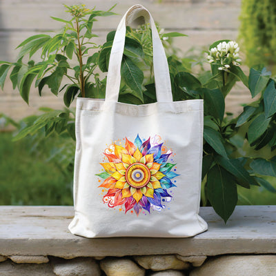 a white tote bag with a colorful flower on it